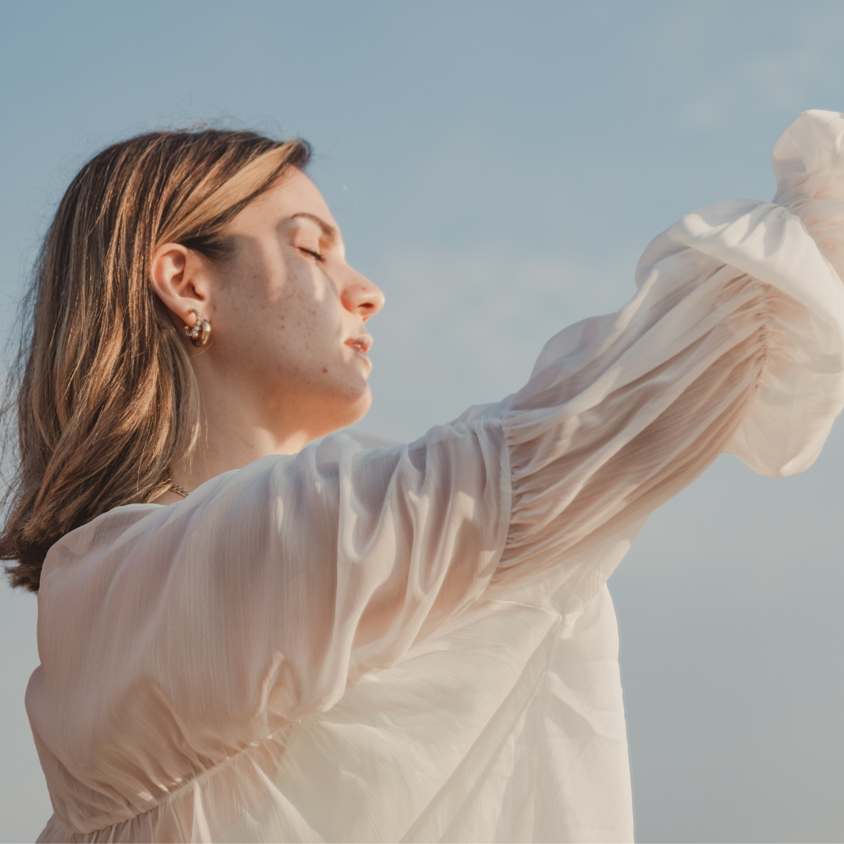 Femme avec rayon de soleil